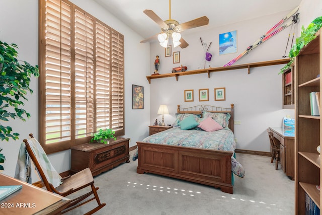 bedroom with light colored carpet and ceiling fan