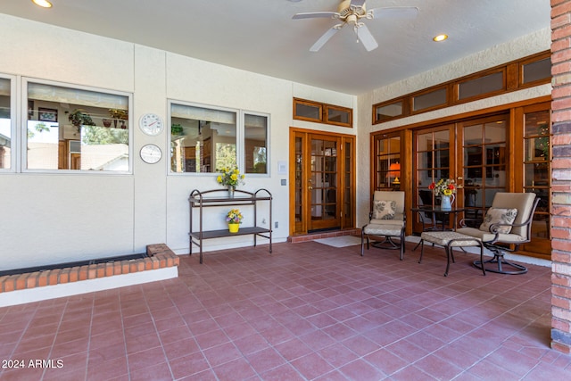 view of patio featuring french doors and ceiling fan