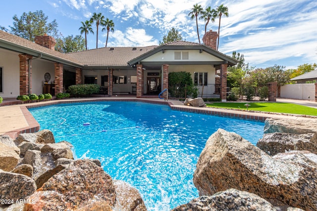 view of swimming pool with a patio area