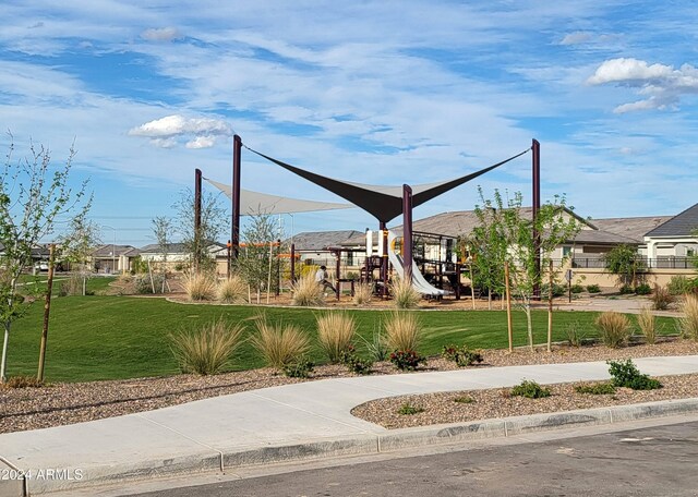 10524 W Bloch Rd, Tolleson, AZ 85353 - surrounding community with a yard and a residential view