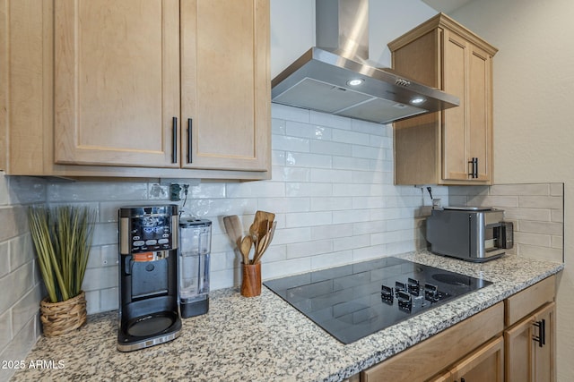 17618 W Medlock Dr, Litchfield Park, AZ 85340 - kitchen with wall chimney exhaust hood, black electric cooktop, tasteful backsplash, and light stone countertops