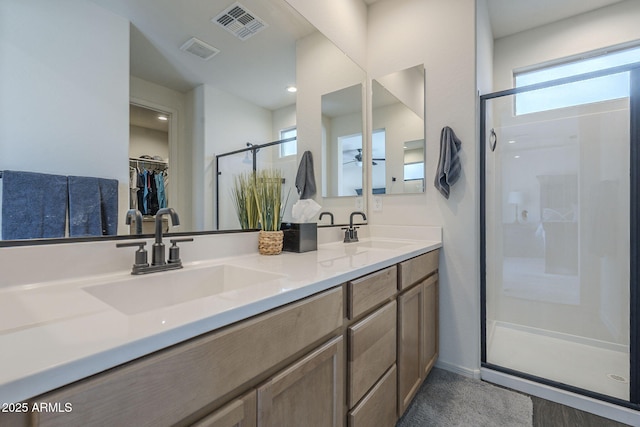 17618 W Medlock Dr, Litchfield Park, AZ 85340 - full bath with a shower stall, double vanity, and a walk in closet