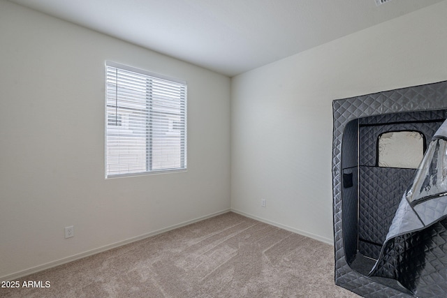 17618 W Medlock Dr, Litchfield Park, AZ 85340 - spare room with carpet flooring and baseboards
