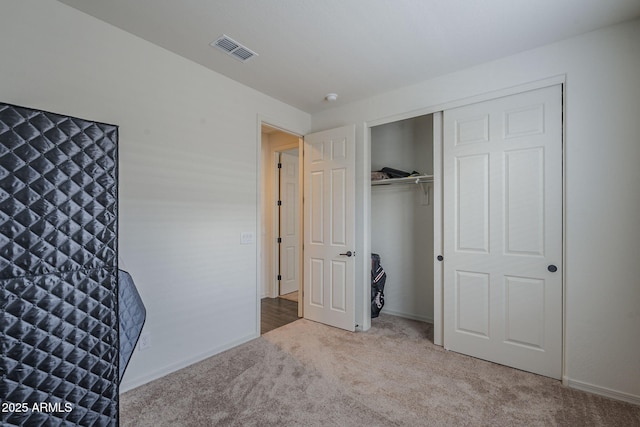 17618 W Medlock Dr, Litchfield Park, AZ 85340 - unfurnished bedroom featuring carpet, baseboards, and a closet