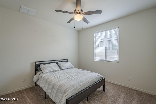 17618 W Medlock Dr, Litchfield Park, AZ 85340 - bedroom featuring carpet flooring, baseboards, and ceiling fan