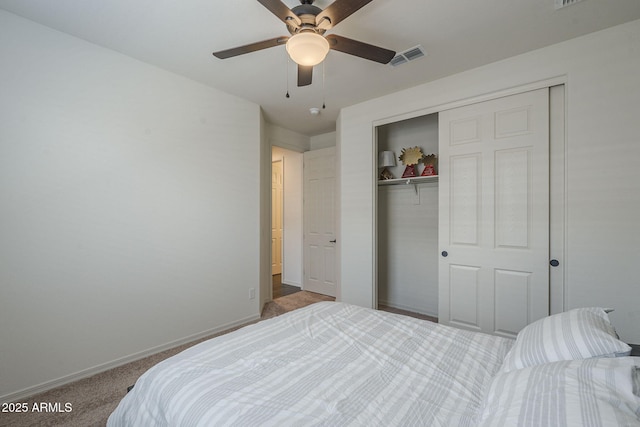 17618 W Medlock Dr, Litchfield Park, AZ 85340 - carpeted bedroom featuring a closet, baseboards, and a ceiling fan