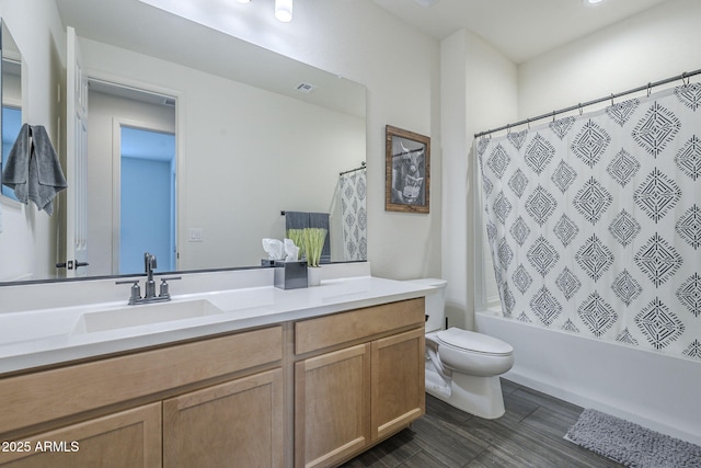 17618 W Medlock Dr, Litchfield Park, AZ 85340 - full bathroom featuring vanity, toilet, shower / bath combination with curtain, and wood finished floors