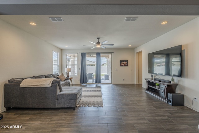 17618 W Medlock Dr, Litchfield Park, AZ 85340 - living area with plenty of natural light, a ceiling fan, baseboards, and recessed lighting