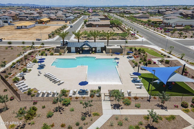 17618 W Medlock Dr, Litchfield Park, AZ 85340 - community pool with a residential view, a mountain view, and a patio area