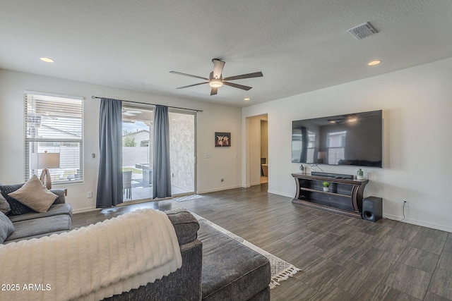 17618 W Medlock Dr, Litchfield Park, AZ 85340 - living area with wood finished floors, ceiling fan, baseboards, and recessed lighting