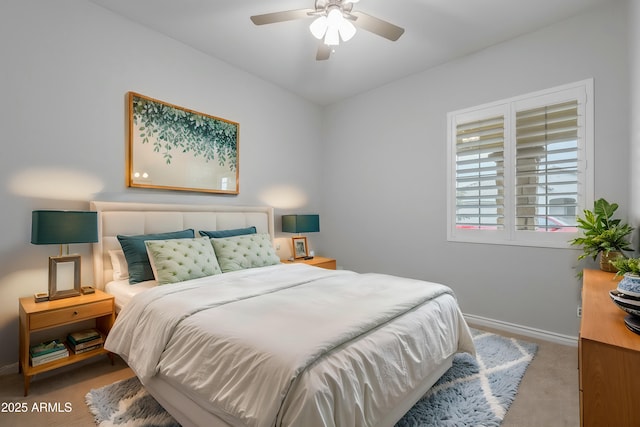 bedroom featuring ceiling fan and carpet floors