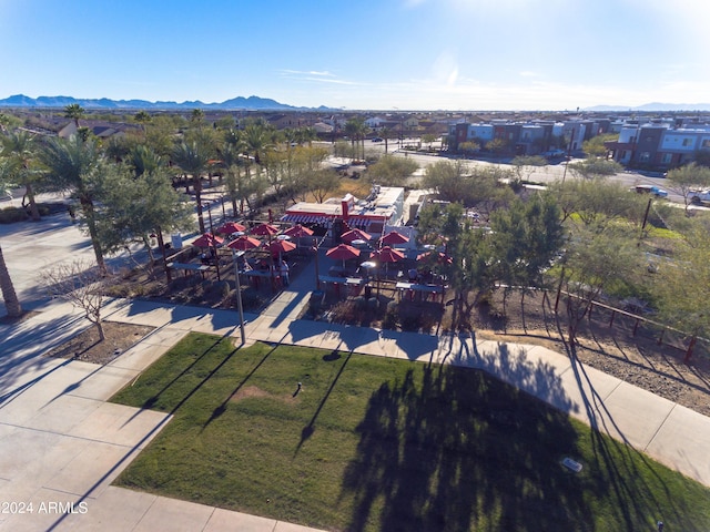 birds eye view of property featuring a mountain view