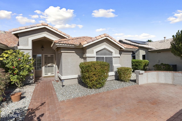 view of front of house featuring a patio area