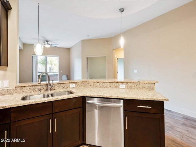 kitchen with light hardwood / wood-style flooring, sink, dark brown cabinets, dishwasher, and ceiling fan