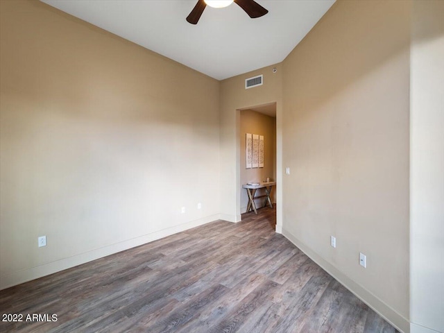 unfurnished room featuring hardwood / wood-style flooring and ceiling fan