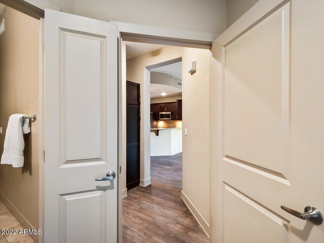 hall featuring hardwood / wood-style flooring