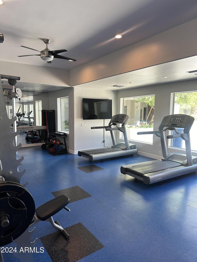 workout area featuring ceiling fan