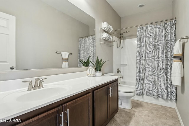 full bathroom featuring tile patterned floors, vanity, toilet, and shower / bath combo with shower curtain