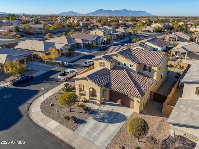 birds eye view of property featuring a mountain view