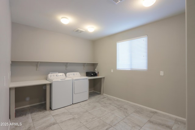 laundry area with washer and dryer