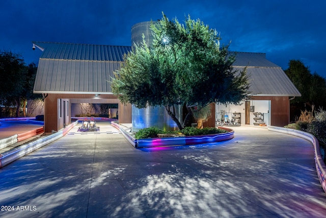 view of front of house featuring a patio