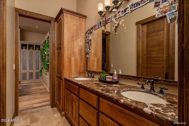 bathroom featuring vanity and wood-type flooring