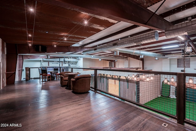 basement featuring hardwood / wood-style flooring