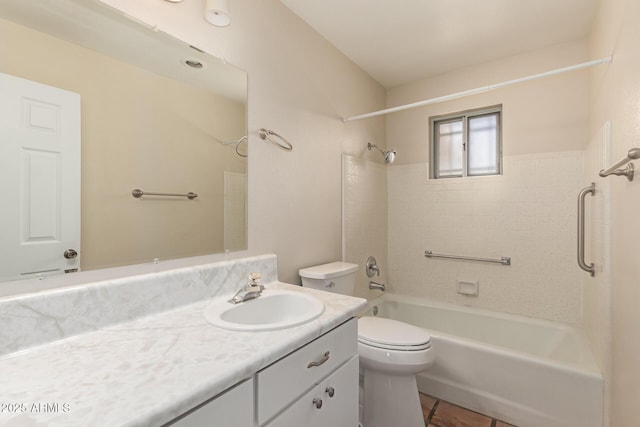 bathroom featuring tile patterned floors, toilet, vanity, and shower / bath combination