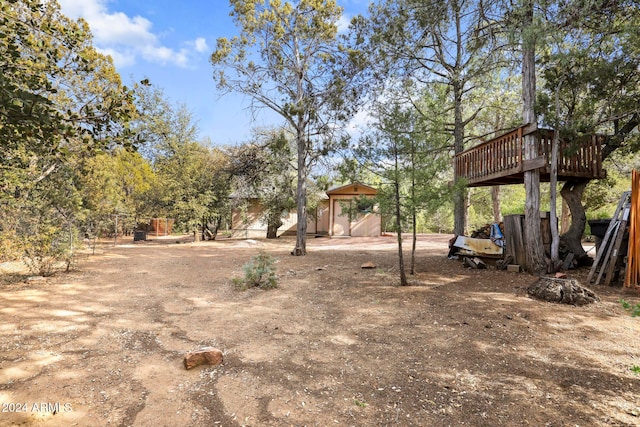 view of yard featuring a deck