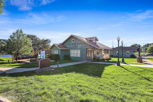 view of front of home with a front yard