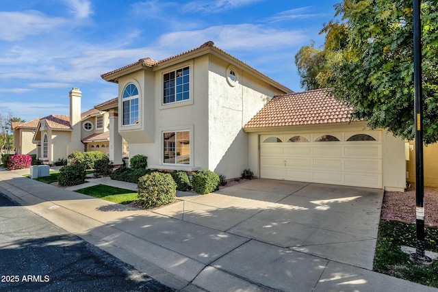 view of front of property with a garage