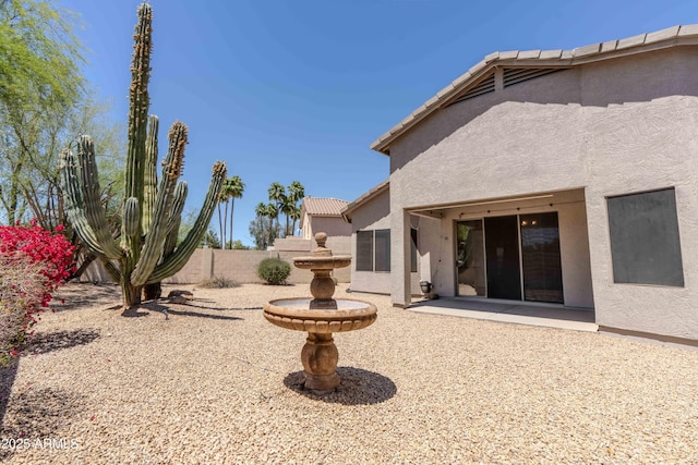 view of yard featuring a patio and fence