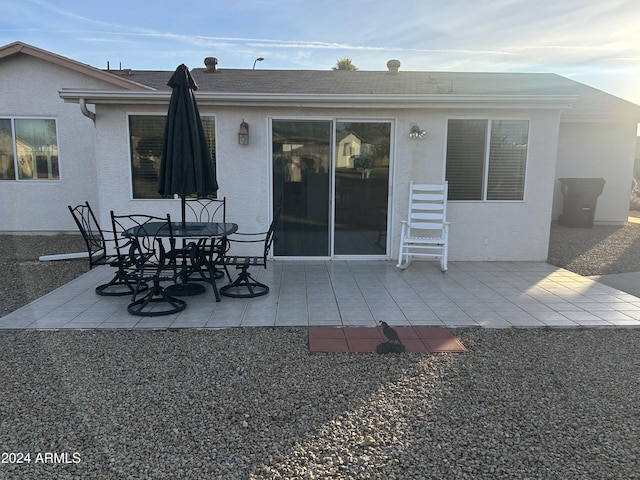 back of house featuring a patio area