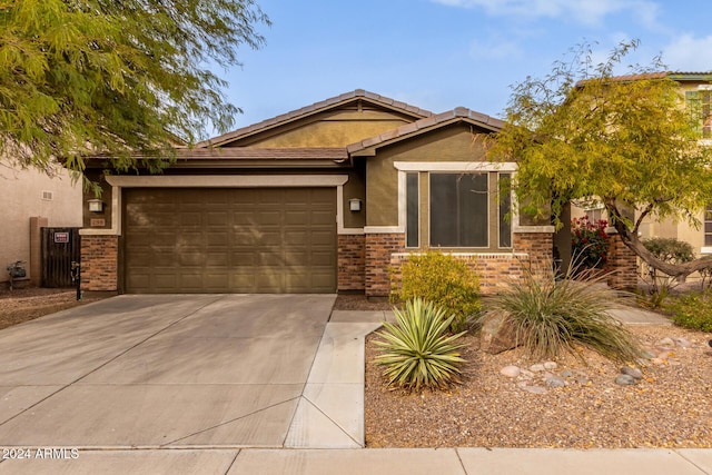 view of front of property with a garage