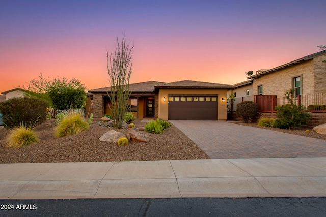 view of front of home with a garage