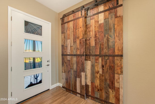 doorway featuring light hardwood / wood-style floors