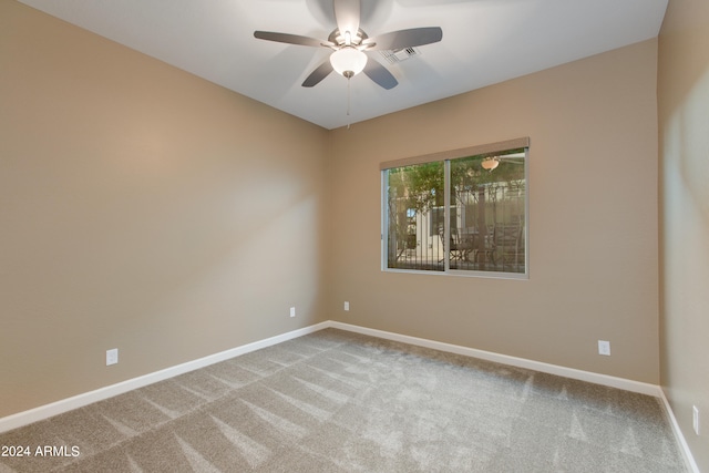 empty room with carpet floors and ceiling fan