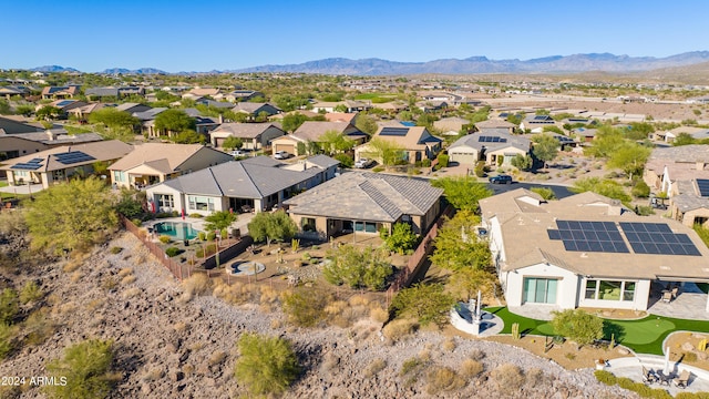 drone / aerial view featuring a mountain view