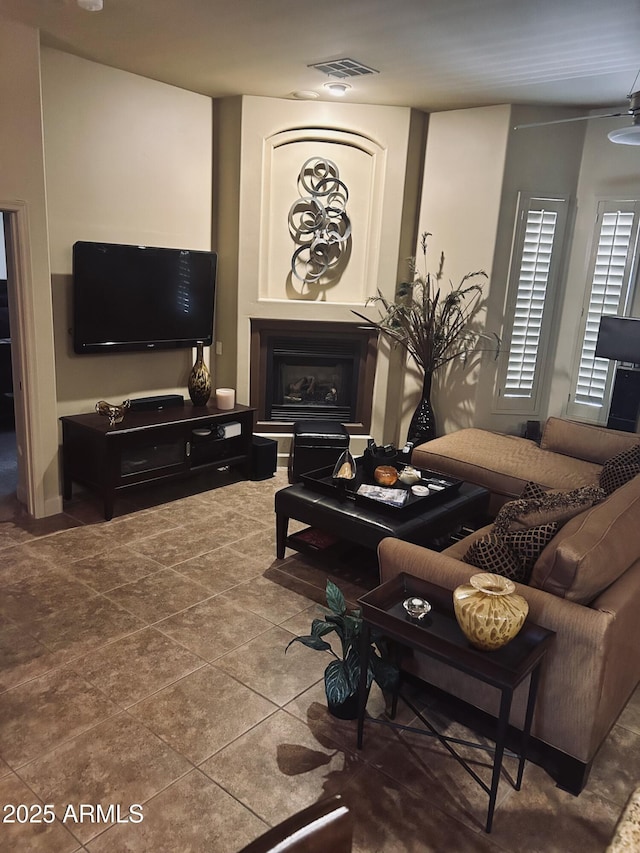 14000 N 94th St Unit 1077, Scottsdale, AZ 85260 - living area with a fireplace and tile patterned flooring