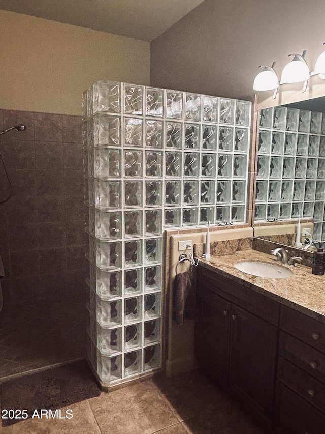 14000 N 94th St Unit 1077, Scottsdale, AZ 85260 - bathroom with a walk in shower, vanity, and tile patterned floors