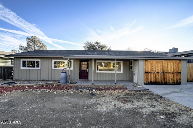 ranch-style home featuring covered porch