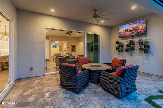 view of patio / terrace featuring an outdoor living space and ceiling fan