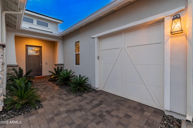 entrance to property with a garage