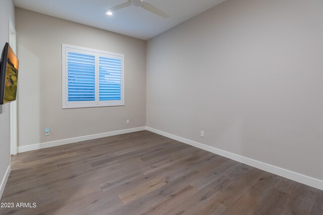 unfurnished room featuring wood-type flooring and ceiling fan