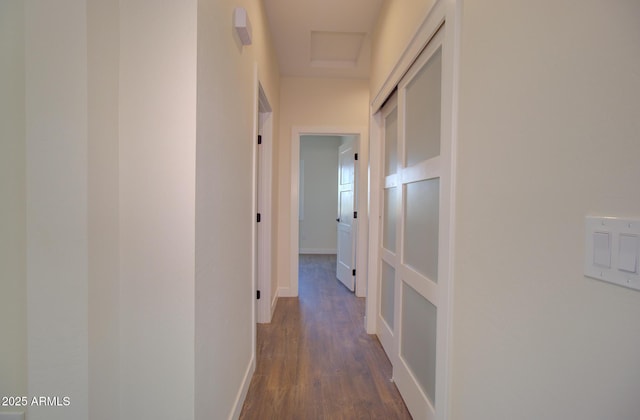 4115 N Monarch Dr, Eloy, AZ 85131 - hallway with dark wood-type flooring and baseboards