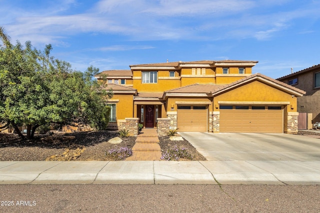 prairie-style home with stucco siding, a garage, stone siding, driveway, and a tiled roof