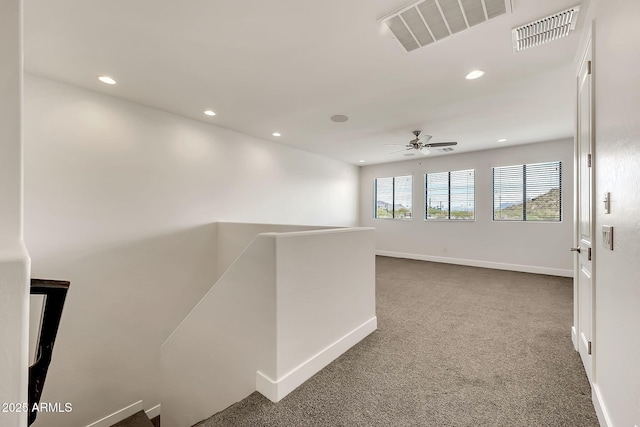 9017 E June Cir, Mesa, AZ 85207 - hallway with an upstairs landing, dark colored carpet, recessed lighting, and baseboards