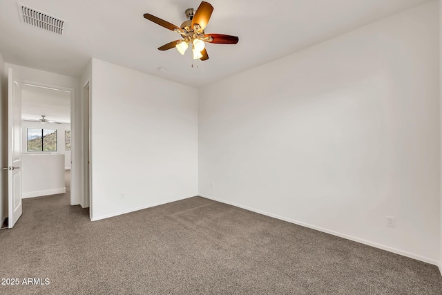 9017 E June Cir, Mesa, AZ 85207 - carpeted spare room featuring ceiling fan and baseboards