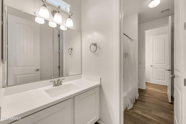 9017 E June Cir, Mesa, AZ 85207 - full bath with vanity, wood finished floors, and a shower with curtain
