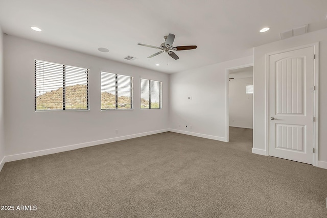 9017 E June Cir, Mesa, AZ 85207 - carpeted spare room featuring a ceiling fan, baseboards, and recessed lighting